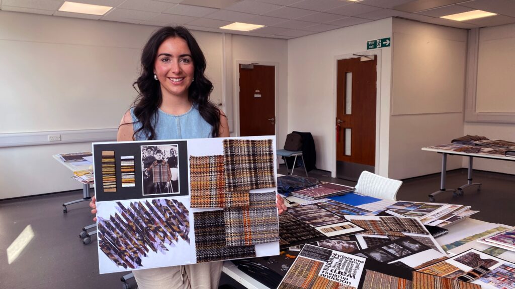 Project winner Megan Beattie , with her woven wool samples inspired by the powerful women of the textile industries in Dundee and Shetland.